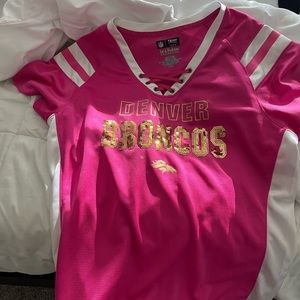 Women’s pink Denver Broncos jersey, size large. Has gold sequins.